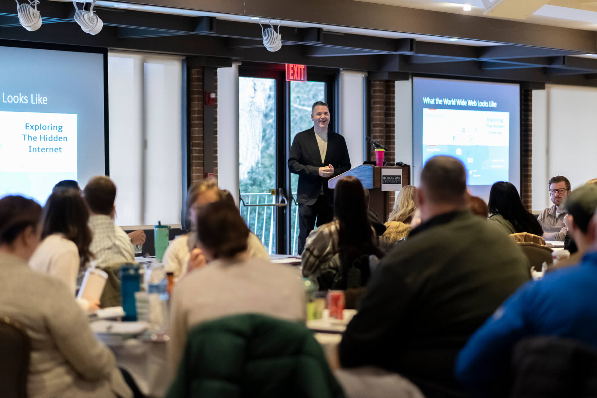 Photo of Dr. Tom Holt speaking at the first MSU Center for Cybercrime Investigation and Training event